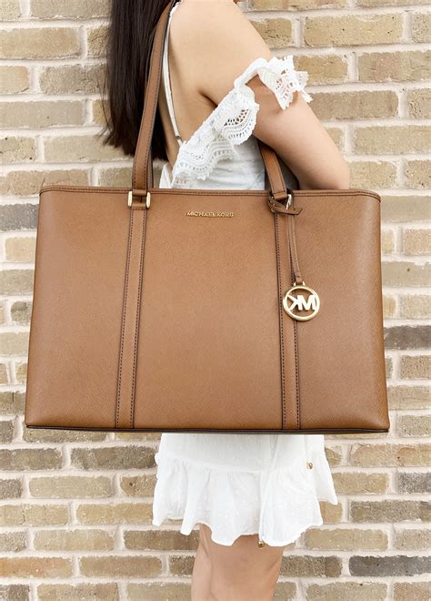 michael kors laptop purse|laptop bag michael kors women.